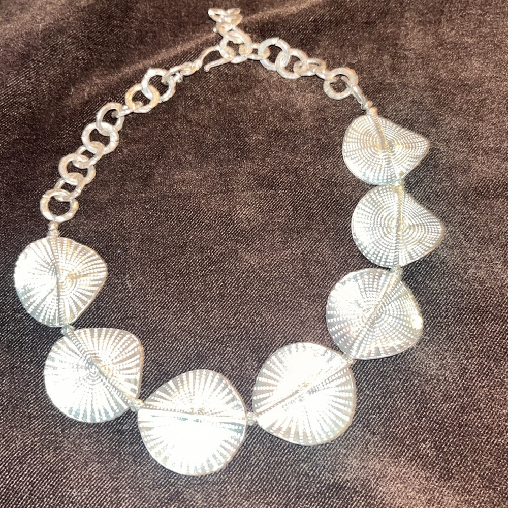 Sterling seashelll necklace handmadede by artisan in Seattle.